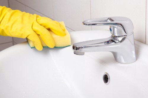 Local communal area cleaning team working in a central London block