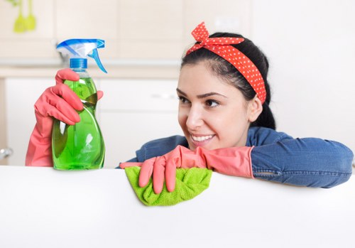 Local technician cleaning upholstered furniture in central London