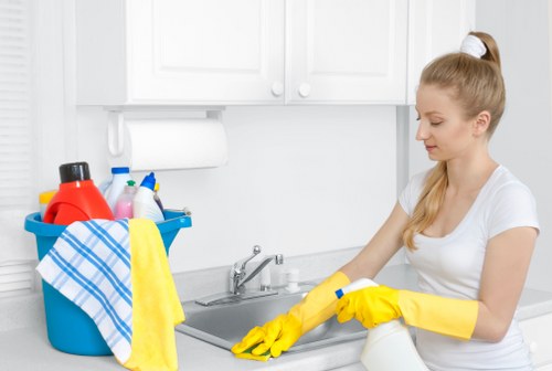 Local specialist deep cleaning a polished hard floor surface